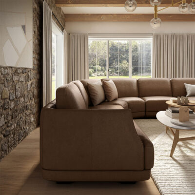 Natuzzi Carter sofa - shown in leather. And side profile showing the curved sofa